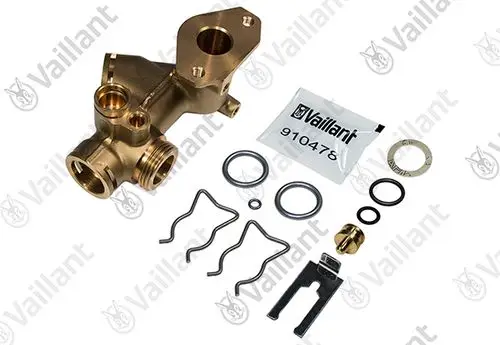 Vaillant Anschlussstück aus Messing mit Zubehörteilen, einschließlich Dichtungen, Riegeln und einer Tüte mit Artikelnummer.